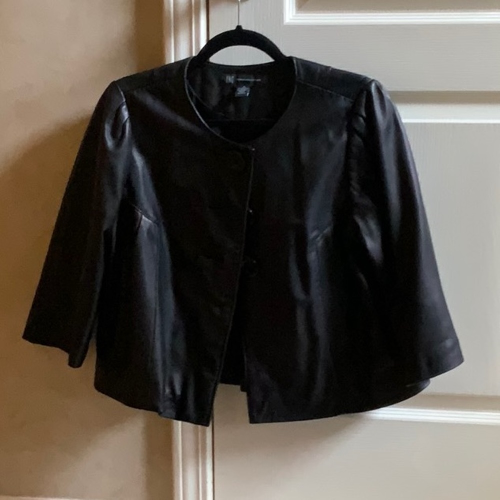 Black faux leather jacket.